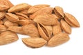 Almonds heap isolated on white background. Panorama of unpeeled closeup. Nuts collection Royalty Free Stock Photo