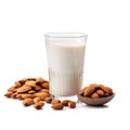 Almonds milk in glass and almonds nuts