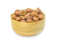 Almonds nut seed in wooden bowl isolated on white background Royalty Free Stock Photo