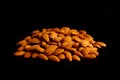 Almonds on black background Royalty Free Stock Photo