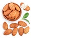 Almonds nuts with leaves isolated on white background with clipping path and full depth of field. Top view with copy Royalty Free Stock Photo