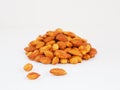 Almonds pile on the white background