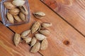 Almonds  popular, healthy, on a rustic background of wood, close-up Royalty Free Stock Photo