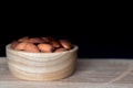 Almonds roasted salt in wooden bowl. Royalty Free Stock Photo