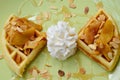 Almonds waffle with wipcream and cyrup Royalty Free Stock Photo