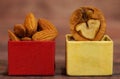 Almonds with walnut in boxes.