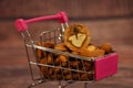 Almonds with walnut in shopping cart.