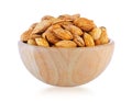 Almonds in wood bowl isolated Royalty Free Stock Photo