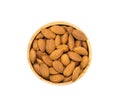 Almonds in wooden bowl on white background, top view Royalty Free Stock Photo