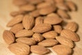 Almonds wooden plates in blur background