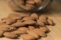 Almonds wooden plates in blur background