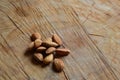 Almonds on a wooden table Royalty Free Stock Photo