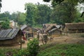 ALMORA, INDIA - SEPTEMBER 02, 2020: An Indian rural village in UTTRAKHAND with mud huts, poultry and people roaming in the