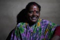 ALMORA, INDIA - SEPTEMBER 06, 2020: low key Portrait of a village woman, wearing traditional clothes