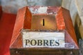 Alms box in the Portuguese Catholic church with the written mention, & x22;POBRES& x22;