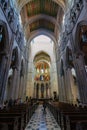 Almudena Cathedral interior corridor with people. Madrid, Spain.