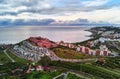 AlmuÃÂ±ÃÂ©car seaside hillside town aerial photo, above drone point of view. Picturesque hills, valleys, agricultural land scape.