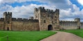 Alnwick Castle. The courtyard of the old castle with arches. Royalty Free Stock Photo