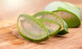 Aloe Vera closeup. Slices of Aloevera plant leaf, gel, natural organic renewal cosmetics, alternative medicine. Skin care concept Royalty Free Stock Photo