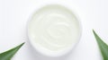 Aloe vera cream with aloe vera leaves on white