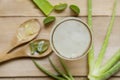 Aloe vera juice in glass over the wooden table Royalty Free Stock Photo