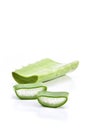 Aloe vera leaf and slice isolated on white background