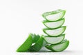 Aloe vera leaf slices with gel on white background. Royalty Free Stock Photo