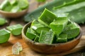 Aloe Vera Slices. Freshly cut pieces of aloe vera plant, known for its soothing and healing properties, isolated on a white