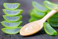 Aloe vera on wooden spoon on wooden table There are many useful herbs