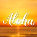 Aloha calligraphy lettering on bright background with sunset over the sea. Summer holidays banner. Hand written Hawaiian language