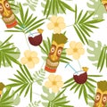 Aloha Seamless pattern with leaves and Tiki mask Royalty Free Stock Photo