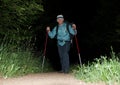 Alone backpacker hikes at night