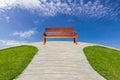 Alone bench in pathway