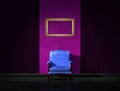 Alone blue chair with empty frame Royalty Free Stock Photo