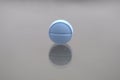 Alone blue round tablet