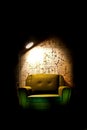 Alone chair in dark room Royalty Free Stock Photo