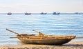 Alone fishing boat beachside in the morning Royalty Free Stock Photo