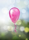 Alone glossy pink balloon on natural spring blurred bubbles back Royalty Free Stock Photo