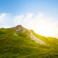 Green mount top in light of evening sun Royalty Free Stock Photo