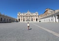 Alone little girl  in the Saint Peter Square in Vatican City Royalty Free Stock Photo