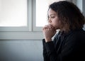Alone and lonely young girl feeling depressed Royalty Free Stock Photo
