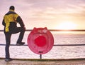 Alone man on pier look over handrail into water Royalty Free Stock Photo