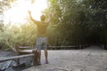 Alone man raised both hands up pray for blessings to god in fore Royalty Free Stock Photo