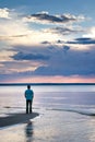 Alone man at sea in sunset Royalty Free Stock Photo