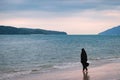 Alone Muslim Woman resting on the beach Royalty Free Stock Photo