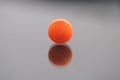 Alone orange round tablet Royalty Free Stock Photo