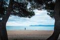 Alone runner on the morning summer beach