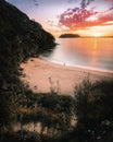 Alone on a secret beach at sunrise Royalty Free Stock Photo