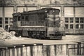 Alone Soviet old train in winter against the background of the railway depot hangars and rails Royalty Free Stock Photo