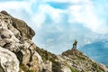Alone at the summit climber and avid landscape Royalty Free Stock Photo